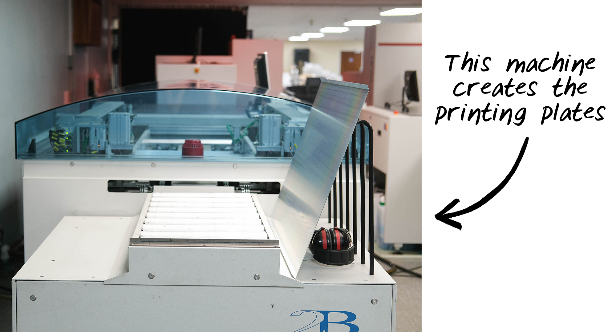 Metal plates are produced to print a newspaper.