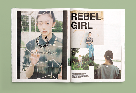 Open tabloid newspaper with a young woman and the title 'rebel girl' on a green background